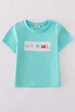 Blue marine creature embroidery smocked top