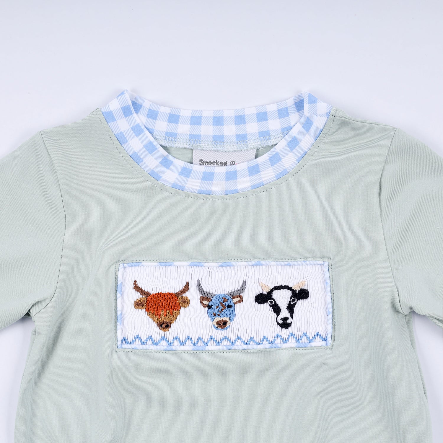 Sage cow hand smocked bubble