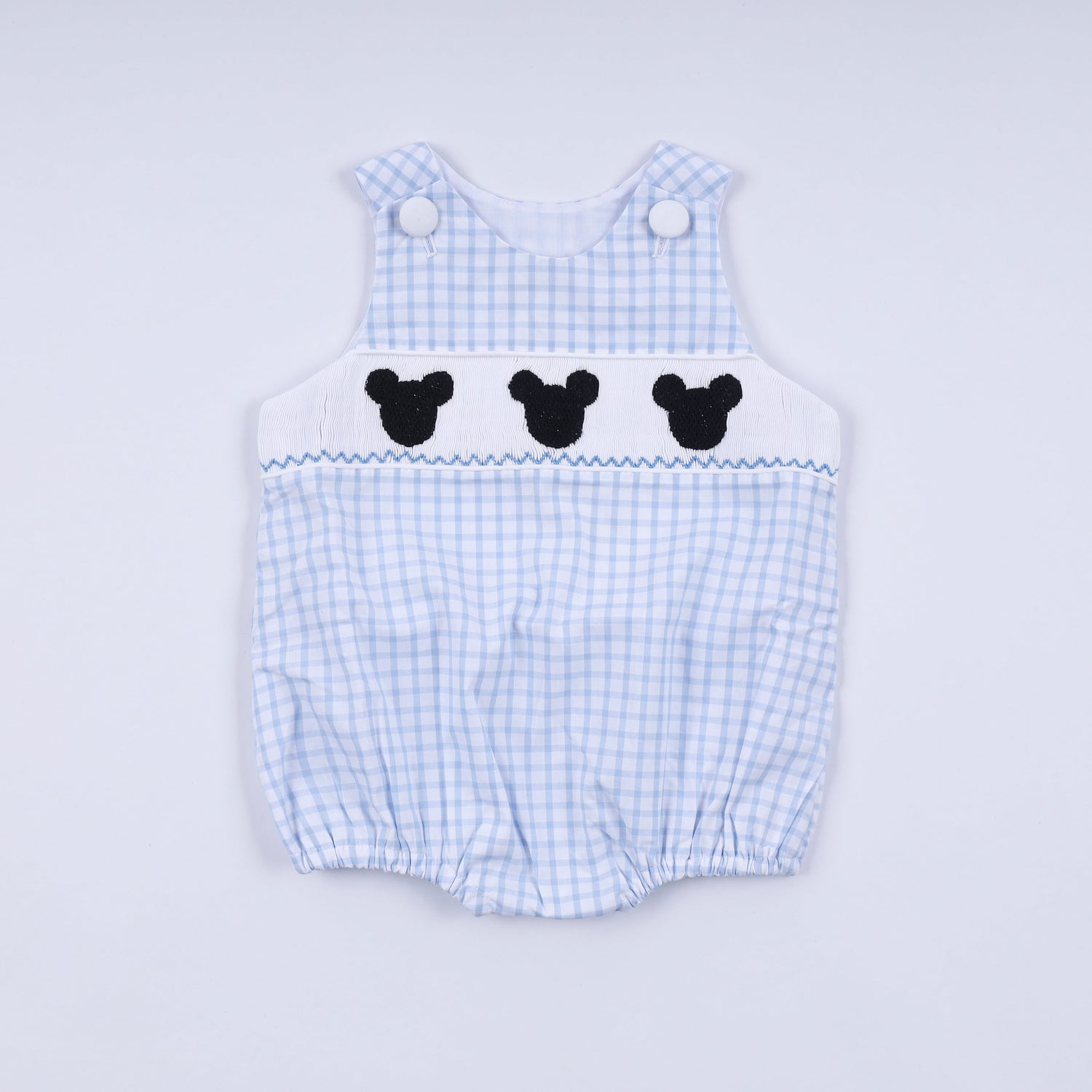 Blue character hand smocked gingham bubble